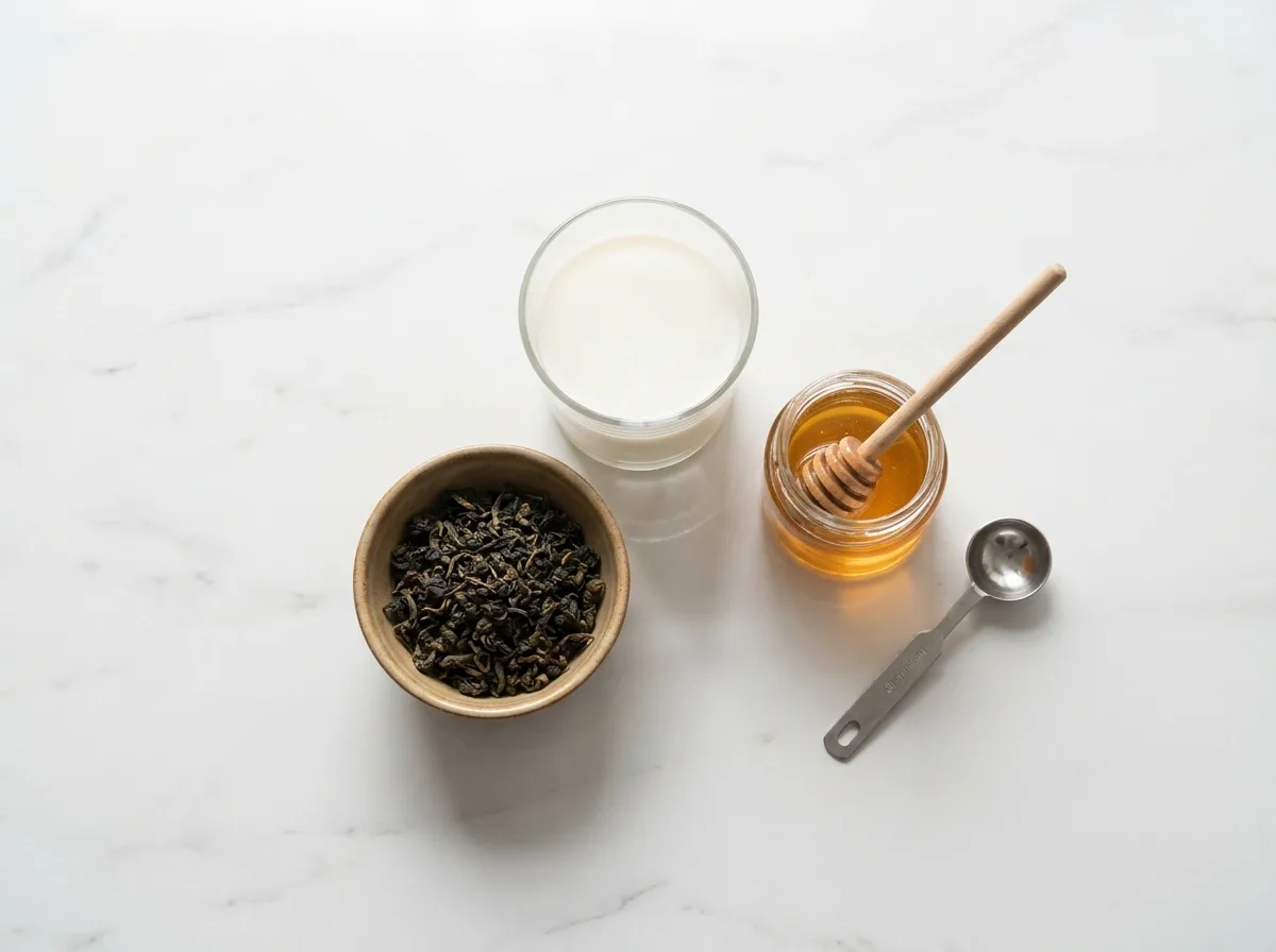 Dong Ding loose leaf oolong tea and whole milk ingredients for homemade milk tea